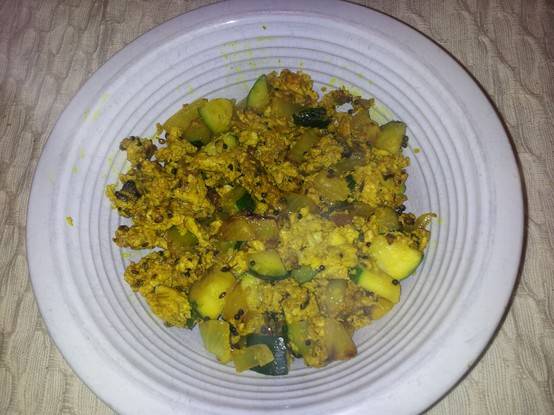 Scrambled eggs and zucchini