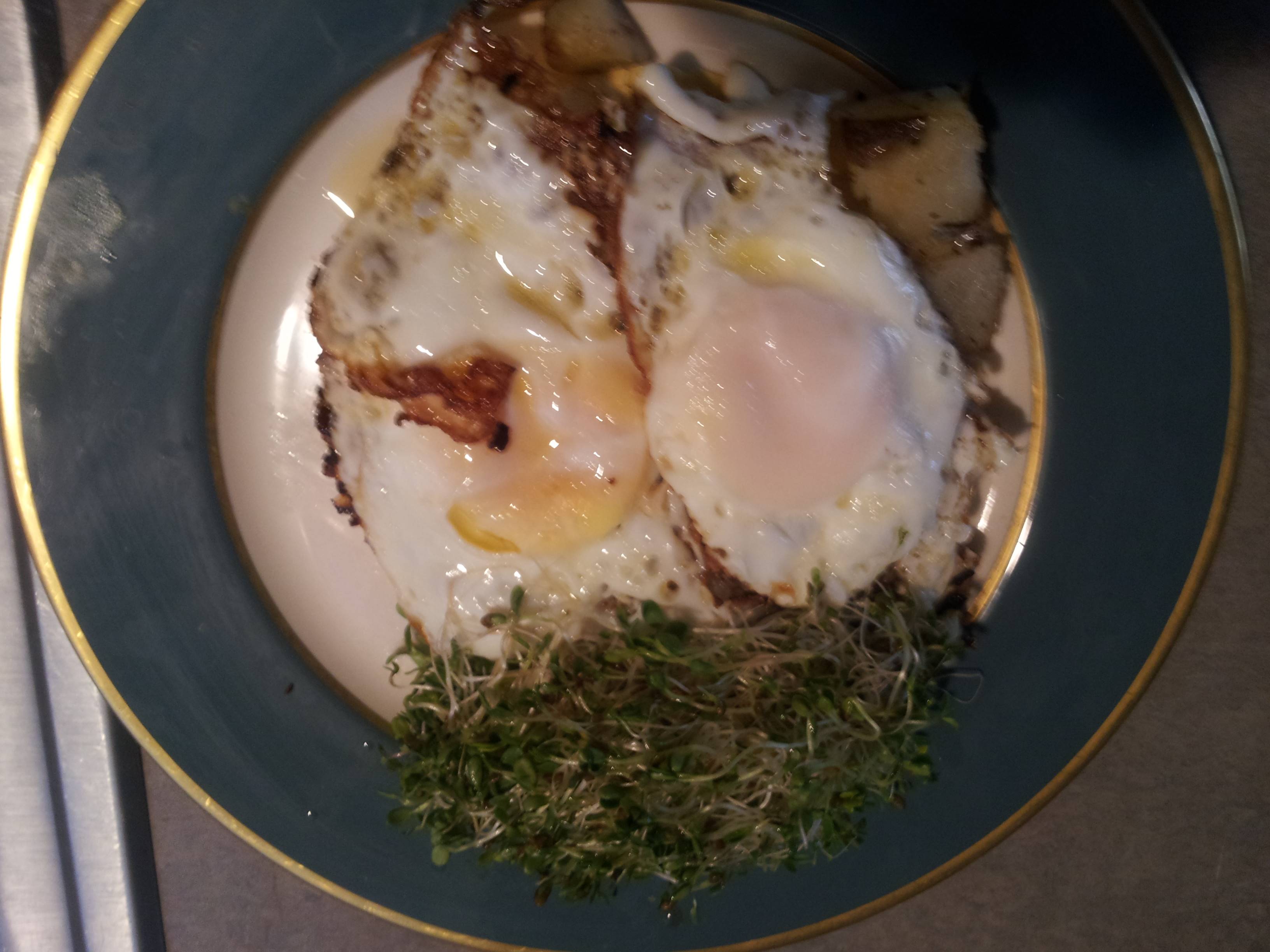 Potatoes and fried eggs