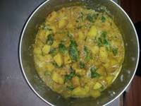 Potato spinach subji